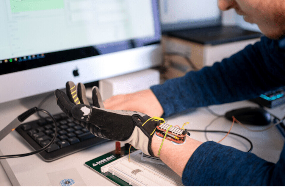 This robotic glove uses AI to help people with hand weakness regain muscle grip