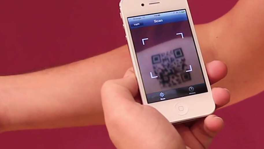 The first random tattoo: generates videos, pictures, Tweets via QR code