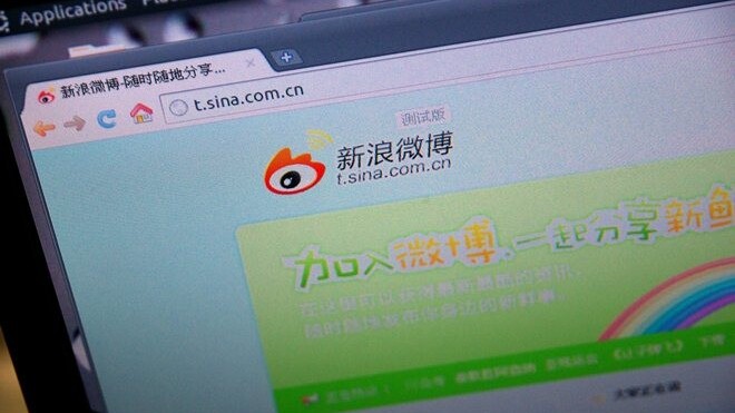 Chinese microblog Sina Weibo ignores concern over new rule, eyes more business users