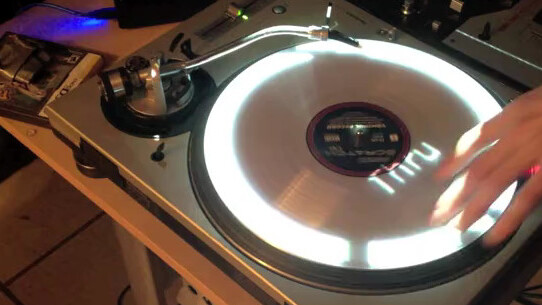 Projector mapping morphs a mixer and turntables into a DJ’s dream GUI