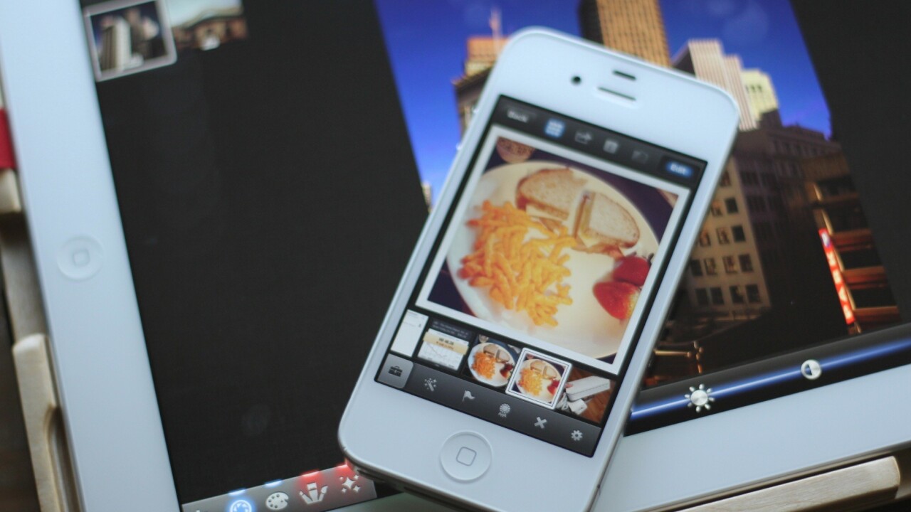 The iPad is growing up, and iPhoto is its puberty