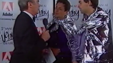 Watch Larry Page and Sergey Brin accept a Webby Award in 2000, wearing silver capes