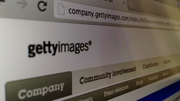 The Carlyle Group, Getty Images founders and management acquire Getty Images for $3.3 billion