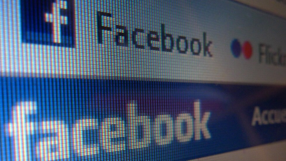 Woman walks off a pier and into the sea while checking Facebook on her phone