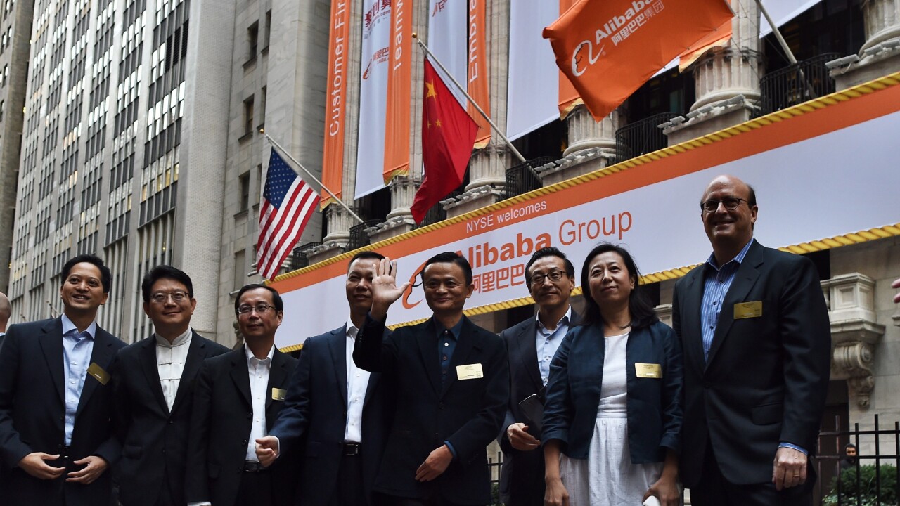 Alibaba kicks off its IPO on the New York Stock Exchange, trading at $92.70 per share