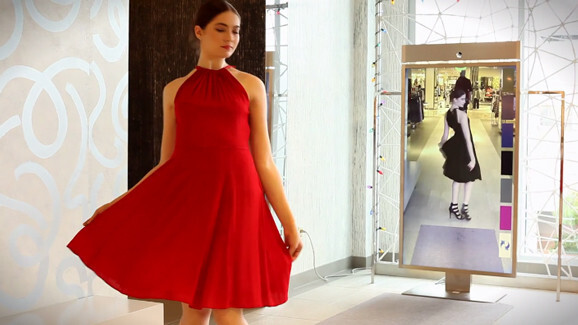 This smart mirror lets you try on different clothes without visiting the fitting room