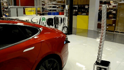 Tesla unveils its mesmerizing car-charging snake because you didn’t want a Model S already