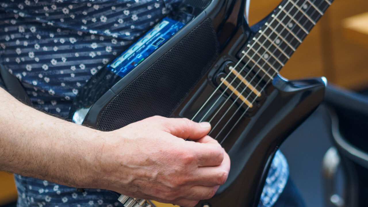 The iPhone-powered Fusion Guitar lets you mix and jam anywhere with a built-in amp