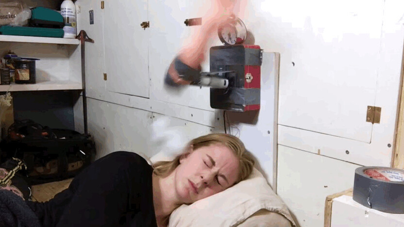 Watch this girl get caught in an alarm clock death machine of her own making