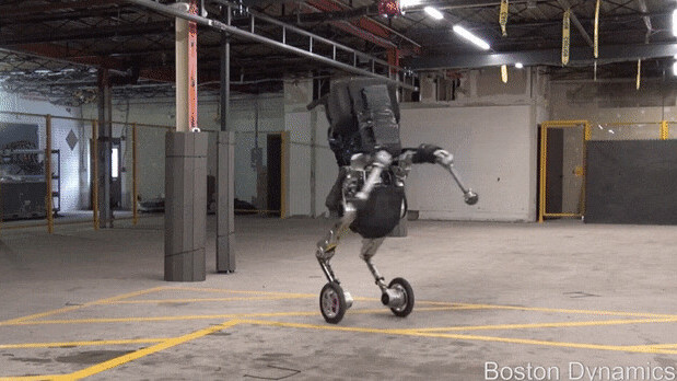 Boston Dynamics’ new robot can jump 4 ft, lift 100 lbs, and skate on 2 wheels