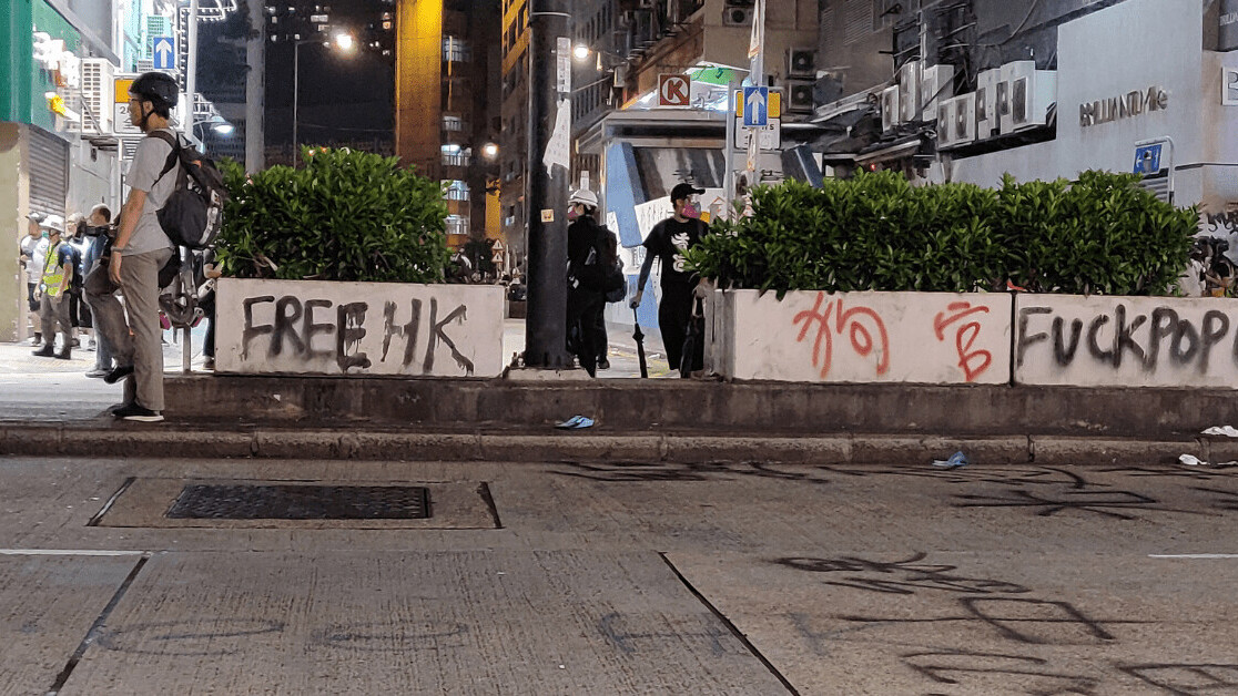 blurring hong kong protest graffiti