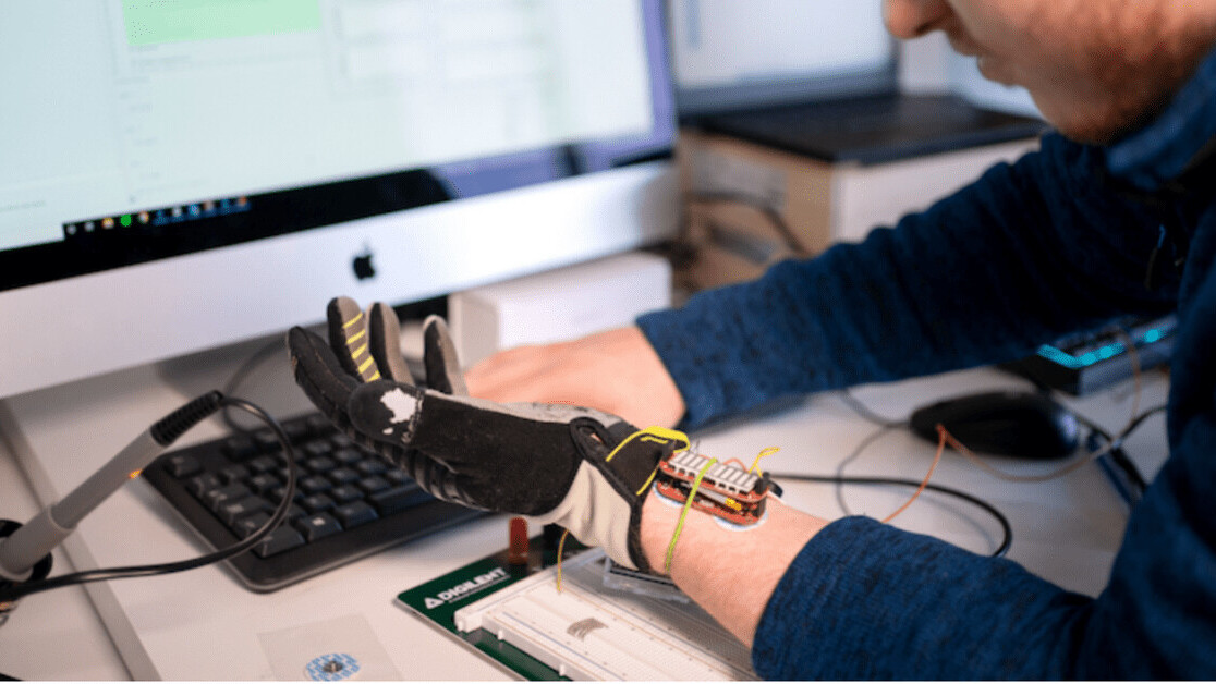 This robotic glove uses AI to help people with hand weakness regain muscle grip