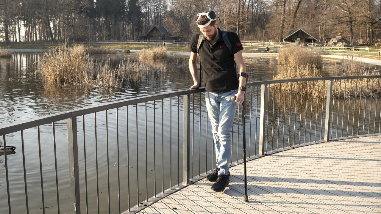 ‘Digital bridge’ between brain and spine enables paralysed man to walk again