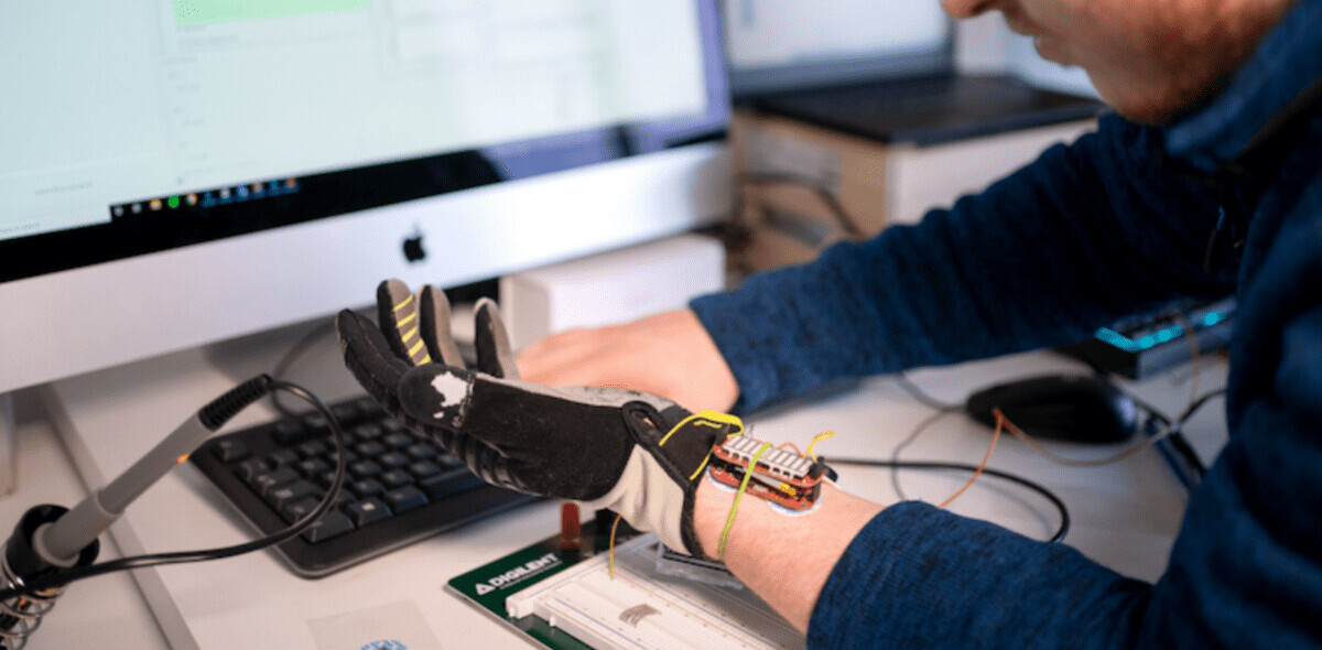 This robotic glove uses AI to help people with hand weakness regain muscle grip