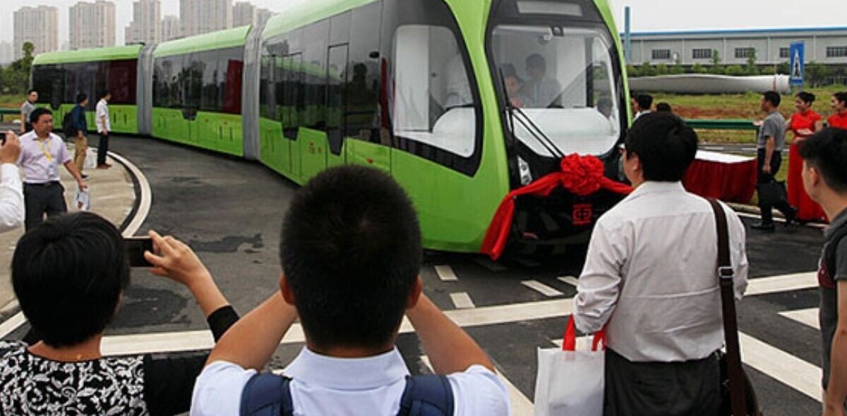 Is China’s autonomous trackless train just a glorified bus? Yeah, pretty much