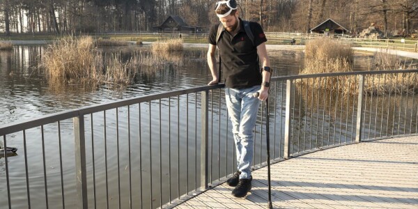 ‘Digital bridge’ between brain and spine enables paralysed man to walk again