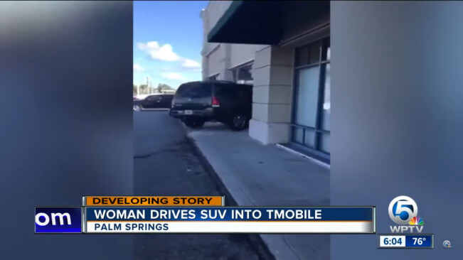 Woman expresses displeasure with T-Mobile’s replacement policy by ramming car into store
