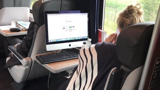 Working on an iMac from a train is a middle finger to portability