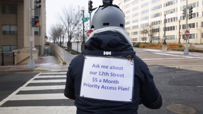 Net neutrality activist ‘throttles’ street traffic outside FCC building