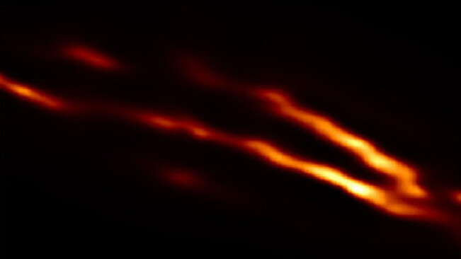 Here’s a badass picture of plasma jets shooting out of a supermassive black hole